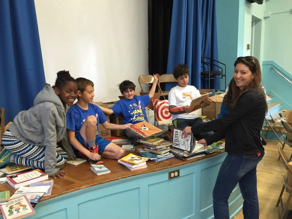 We Benefit Children charitable organization. kids at a book event